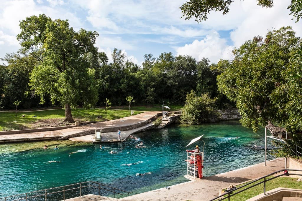 Barton Springs Pool on a sunny day in Austin, Texas