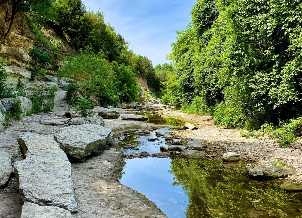 Rocky creek and limestone cliffs along the Barton Creek Greenbelt