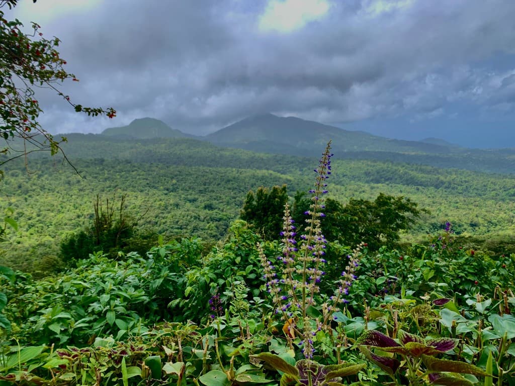 Volcanic lake and rainforest mountains in Dominica